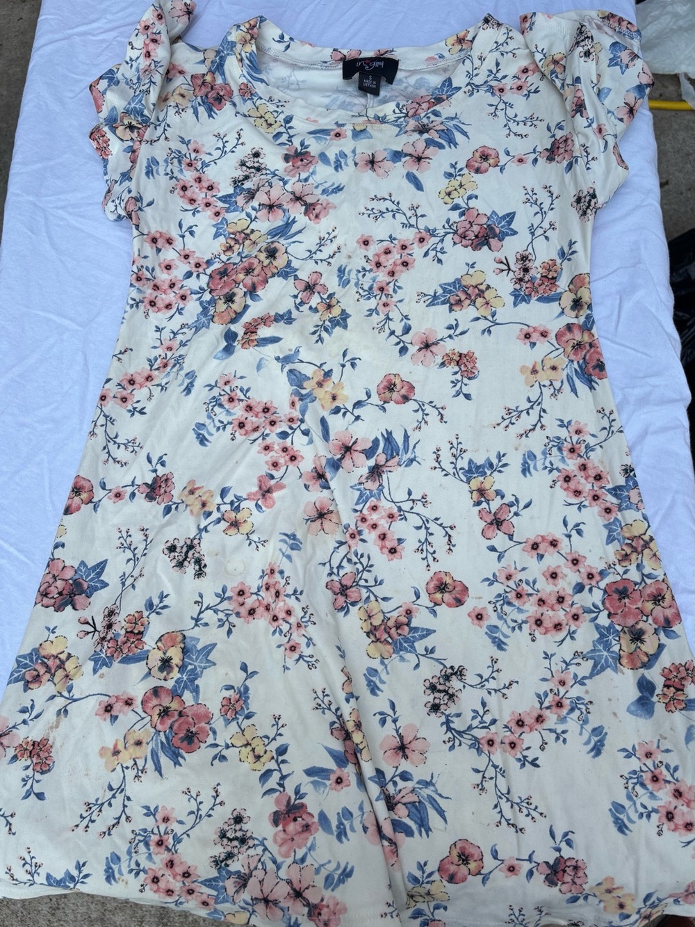 LuLaRoe Cream Mini Dress with Pink, Blue & Yellow Floral Print has stain